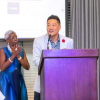 Zenas "Z" Choi accepts the MBA Vanguard Award